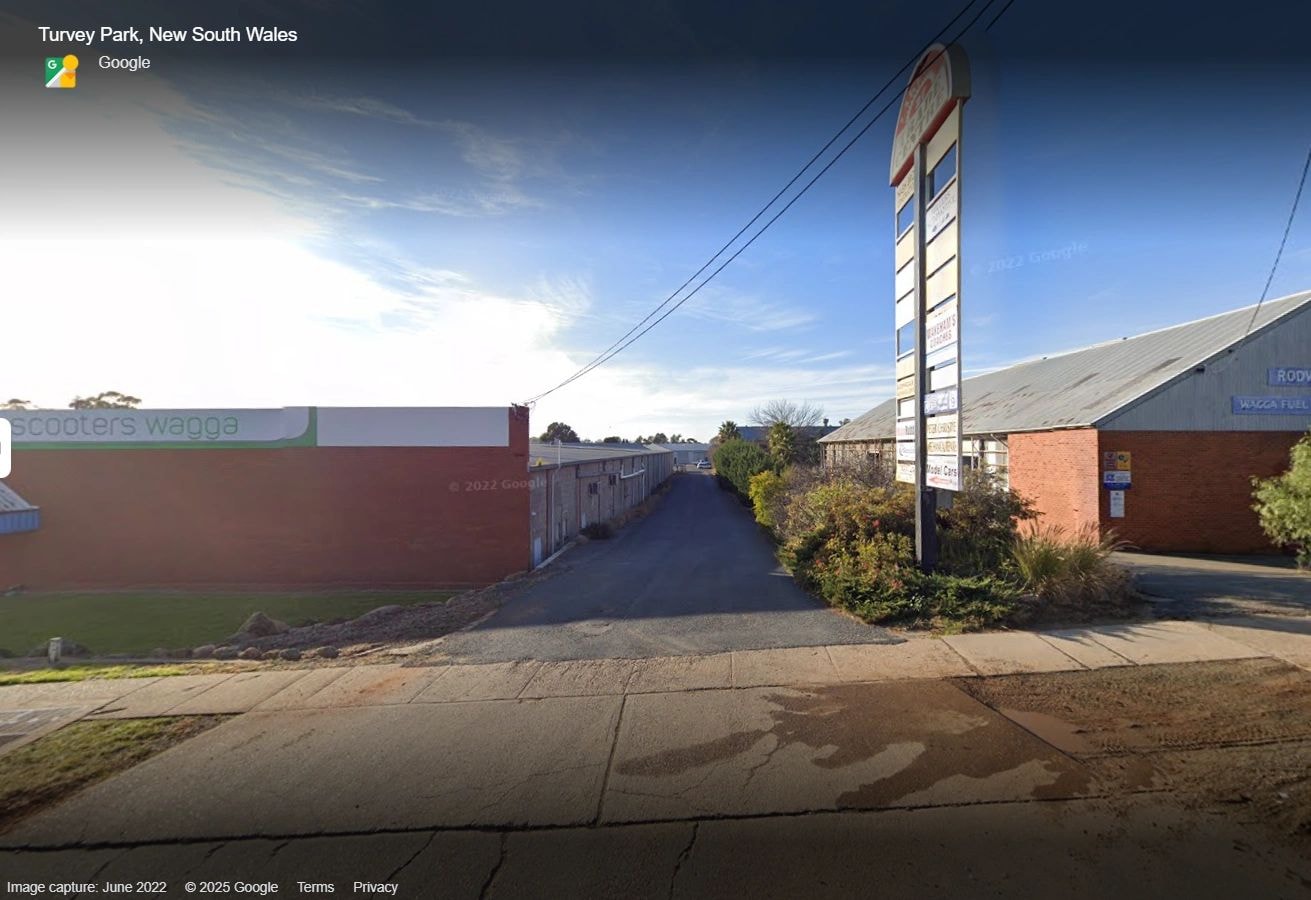 Street view of the access road leading to Riverina Rug Wash